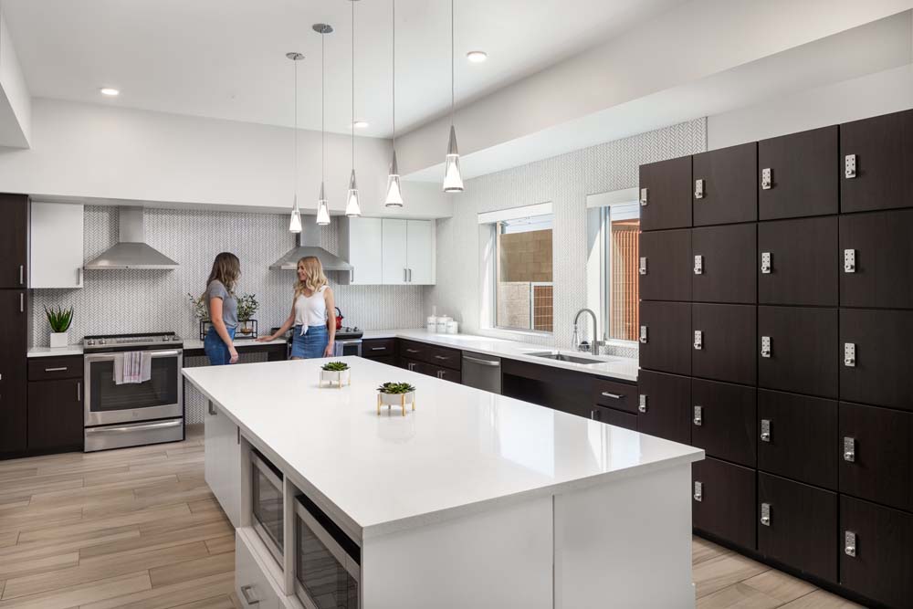 Students in a kitchen area of the student housing