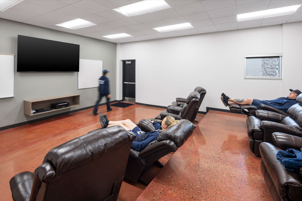 Firefighters in fire station's day room