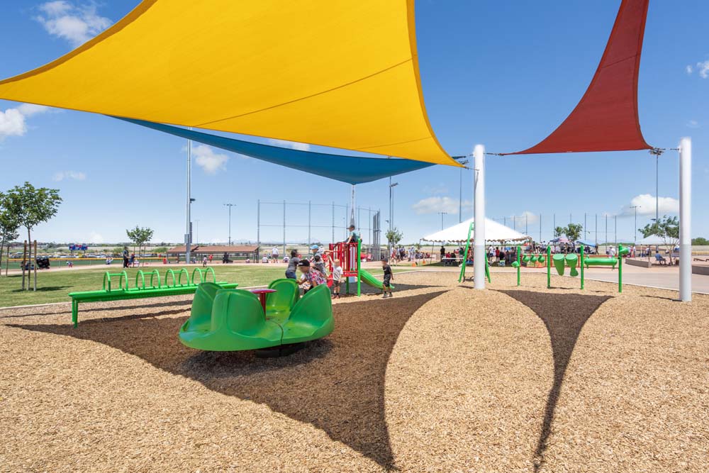 Play area with sail shades